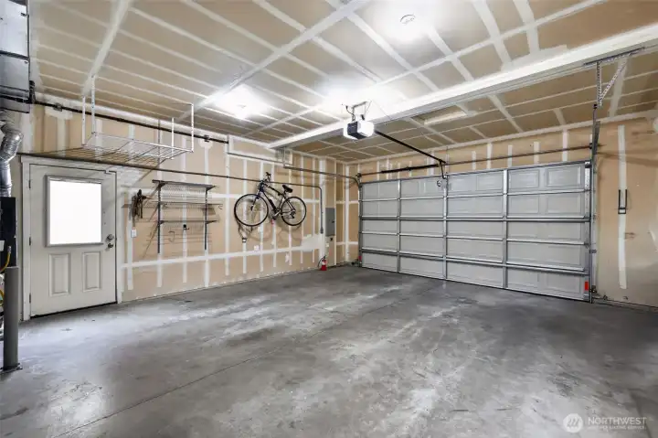 Upgraded HVAC system: equipped with A/C, and HEPA-Air filter. Generously-sized 2-car garage: added space, overhead storage, built-in wall organizers too!
