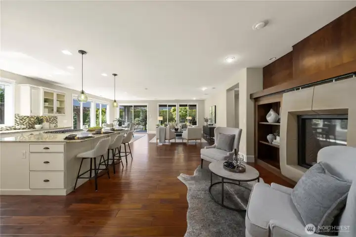 Gleaming Engineered hardwoods, the statement concrete gas fireplace with built-ins and the amazing chef's kitchen greet you as you enter this gorgeous home.