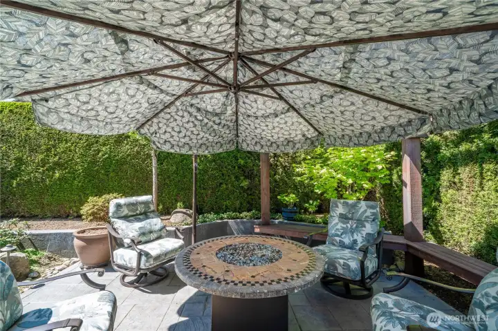 The 13' cantilever umbrella will keep you and your guests in the shade while enjoying the firepit anytime of the year!
