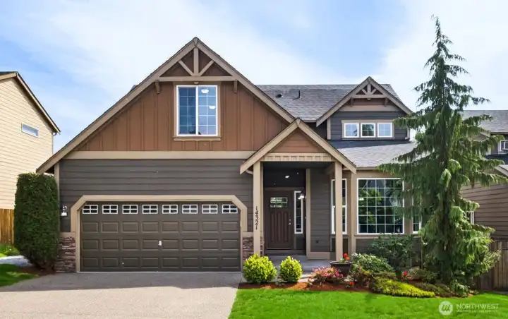 Beautifully maintained original-owner Soundbuilt Northwest resale with timeless Craftsman-inspired curb appeal