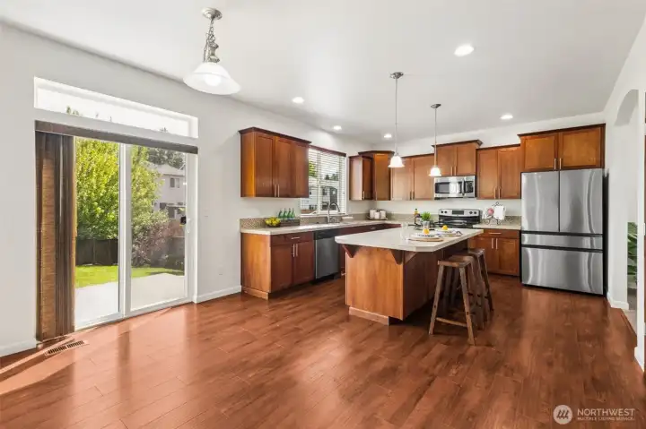 Plenty of room for dinette set between the kitchen and family room