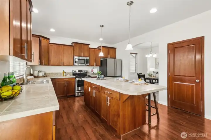 So much cabinetry and counters including the walk in pantry for plenty of storage!
