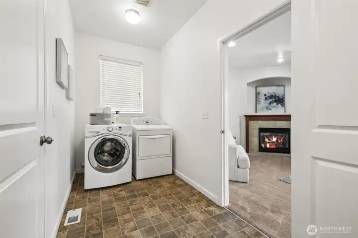 Laundry room doubles as "mud room" conveniently located off the garage