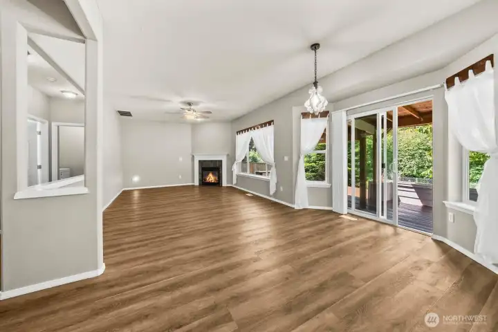 OPEN FAMILY KITCHEN WITH SLIDER TO COVERED DECK