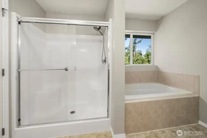 LARGE SHOWER SPACE AND SOAKING TUB