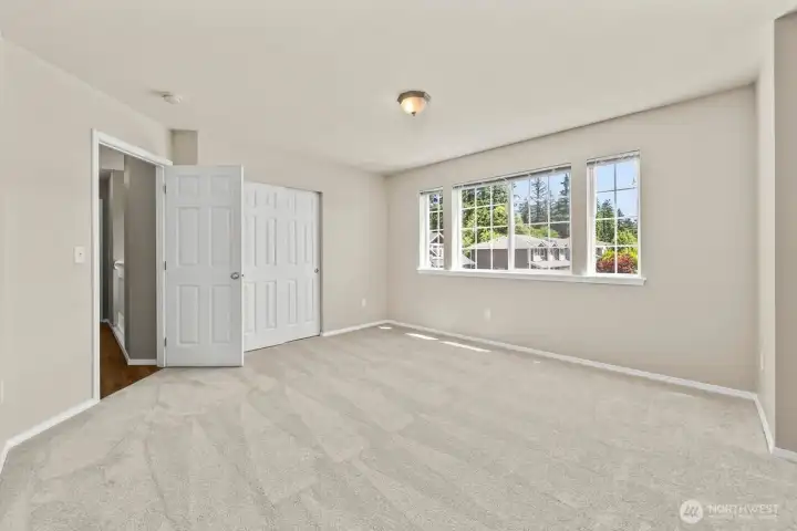 LARGE SECONDARY BEDROOM WITH 2 CLOSETS, COULD EASILY BE USED AS A BONUS ROOM