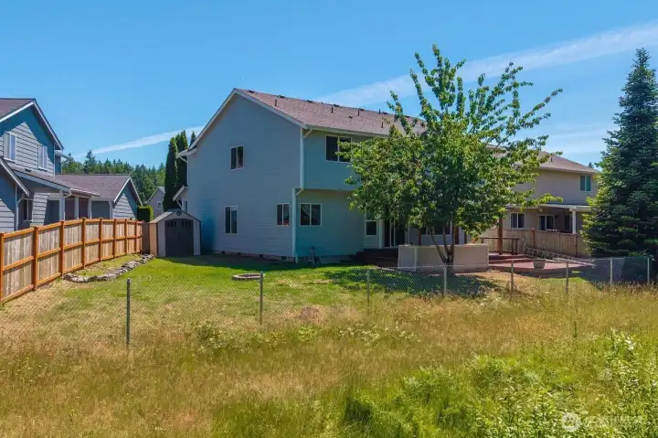 THE PEACEFUL BACK YARD IS TUCKED AGAINST A GREEN BELT FOR PRIVACY