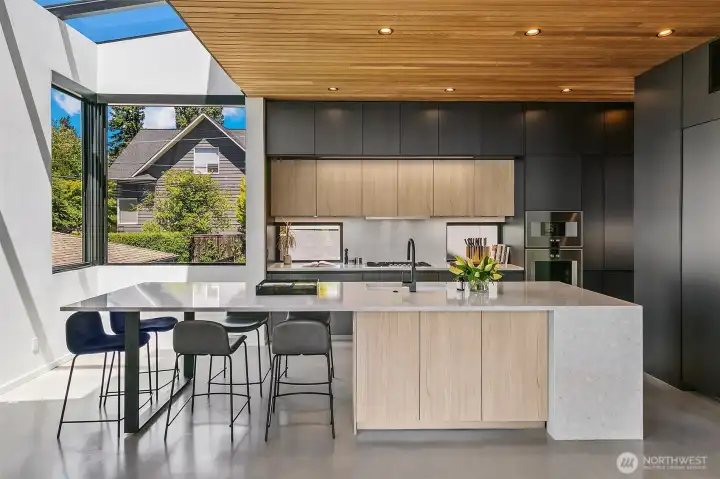 The skylights extend above the eating area. Light cascades from all directions.