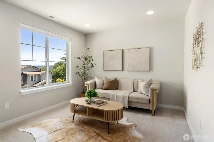 Light-filled upstairs bonus room with Cascade views, offering flexible space for a media lounge, playroom, reading nook, home office, or quiet retreat.