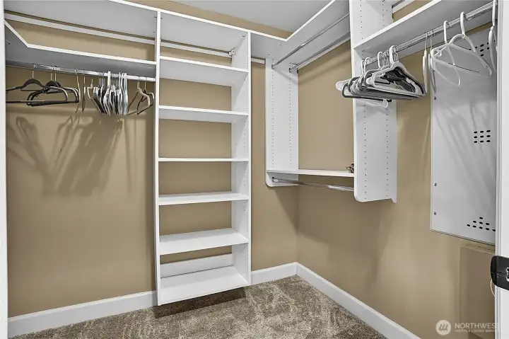primary room walk-in closet. primary room walk-in closet.