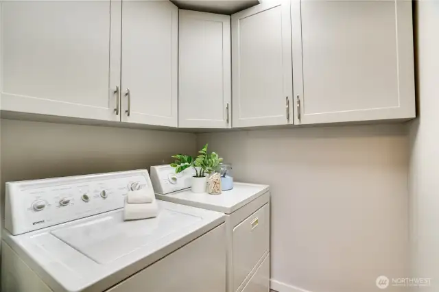 The laundry room in the unit is convenient and has plenty of cabinet space for the Costco run.