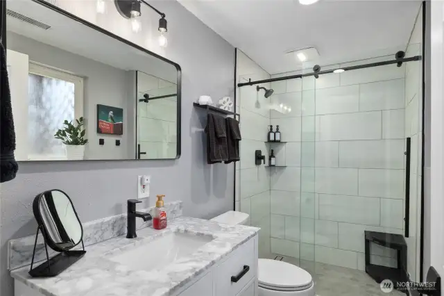Downstairs completely remodeled BRAND NEW Bathroom! All three bathrooms in those are brand new Beautifully updated!