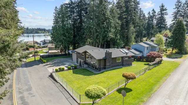 Gorgeous Corner Lot tons of privacy here, bordered by green belt and across the street from Jenks Park boat trailer parking greenery area.