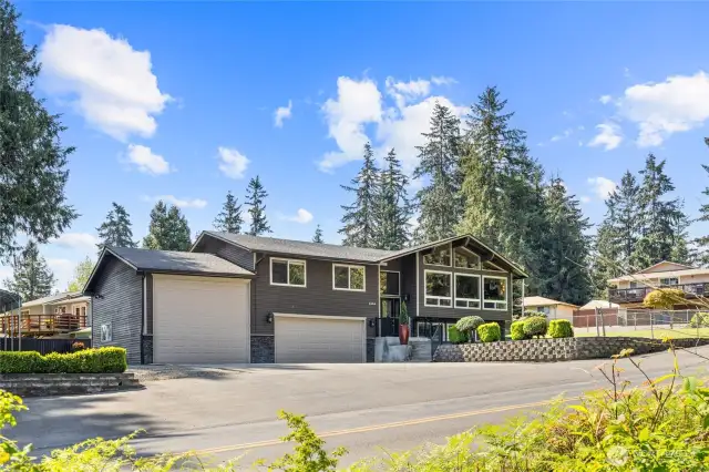 Tons of parking inside and out! Two Garages over 1064sq ft and a covered carport plus RV/Boat parking area! Extra Large Paved area for all your vehicles and guests.