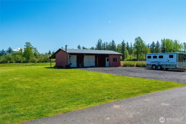 There's also a 3-stall barn with two concrete-floored stalls equipped with auto frost-free waterers, plus a tack/work room and pasture space ready for your equine or hobby farm dreams.