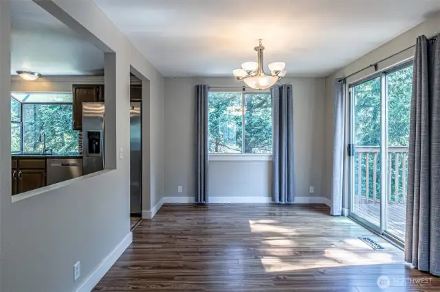 Dining room, the slider opens to a deck.