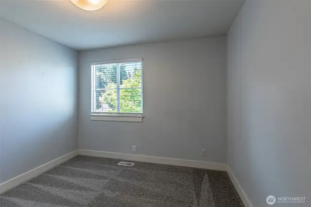 One of three bedrooms on the main floor.