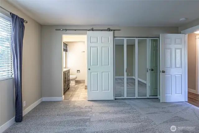 Another view of the primary bedroom.