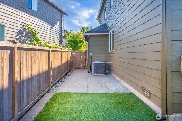 Poured concrete side area with heat pump