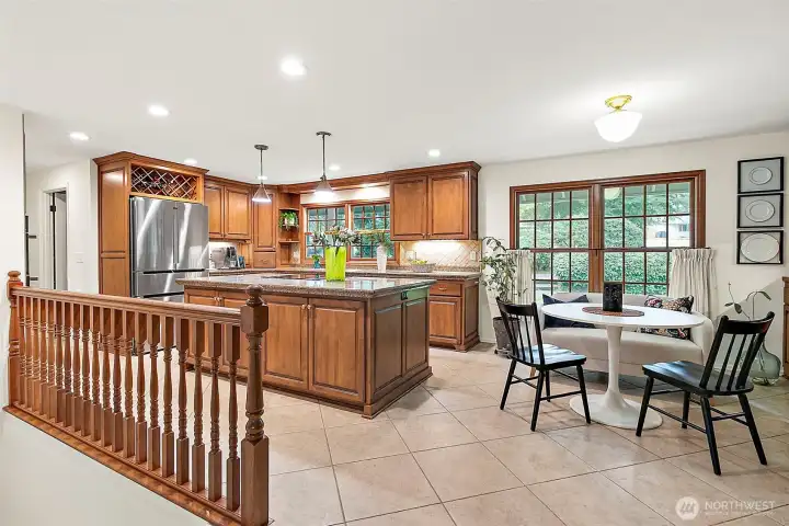 A large center island provides the perfect hub for cooking, gathering, or entertaining, while the thoughtful design blends functionality with charm.