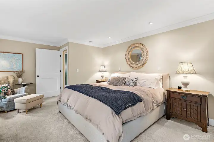 The spacious primary suite easily accommodates a king-size bedroom set and boasts a large walk-in closet along with a spa-inspired 5-piece bath, creating the perfect retreat for comfort and relaxation.