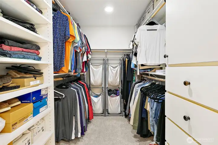 The primary suite boasts a generous walk-in closet with ample storage, offering both functionality and style for an organized retreat.