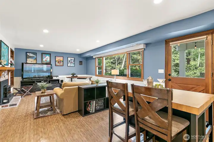 With walkout access to a spacious patio leading directly to the lake, this area is perfect for guests, extended family, or multi-generational living.