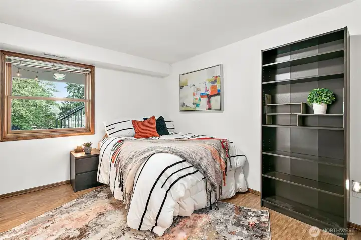 Versatile lower-level flex room could be used for a home office, gym, or additional living space.