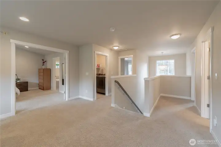 Ascend the stairs to your Large Loft/Bonus space. Let's tour the left...