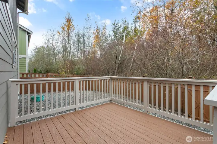 One of the many great features of the home is the protected greenspace behind it.