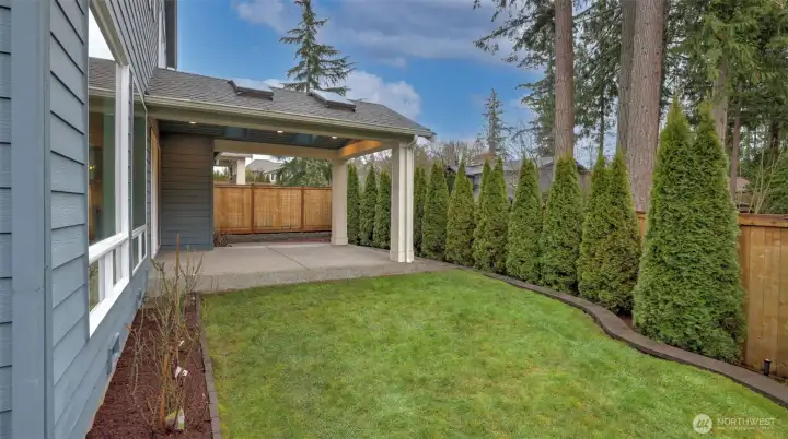 Private, low maintenance yard with added paver patio. Fully-fenced