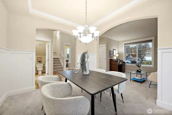 Formal dining room off front living room and grand foyer