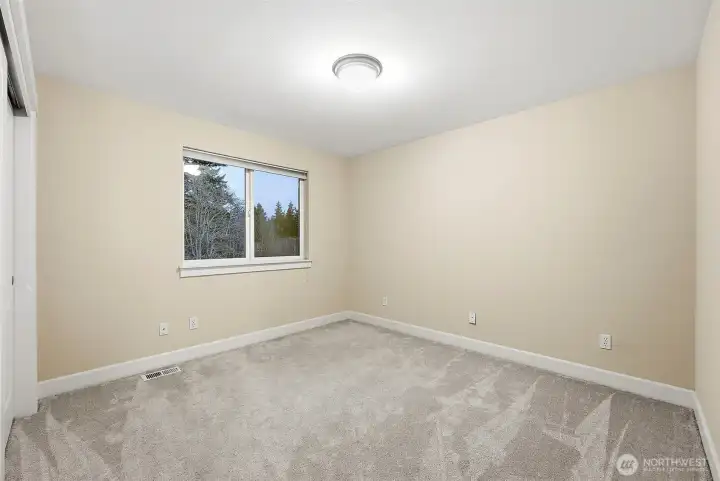 Bedroom 3 upstairs with wall-to-wall carpeted flooring.