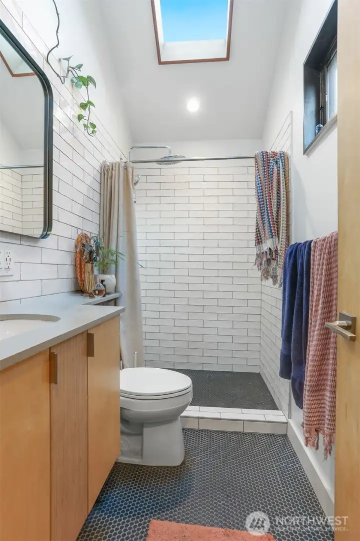 Beth with walk in shower.