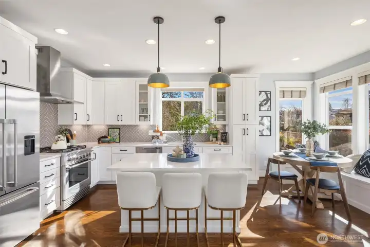 Custom lighting throughout + top of the line appliances