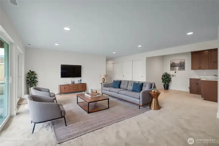 Virtually staged Rec Room/Multi-generational living with w/d hookup.