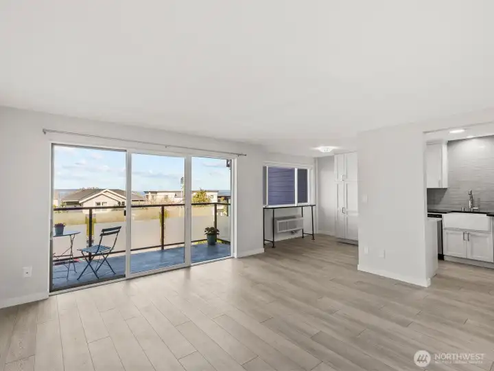 As you near the living room, the view out the back windows will quickly grab your attention.