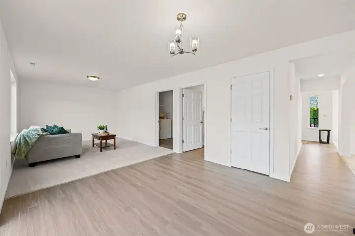 Laundry and powder room located off the family room