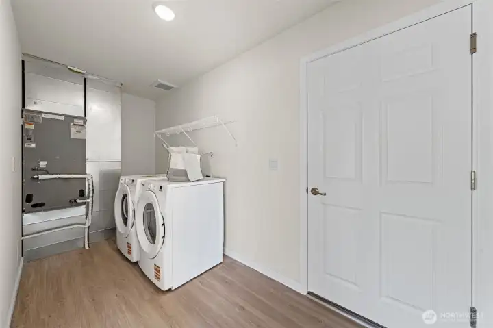 Laundry located right off the garage and duplicates as mud room
