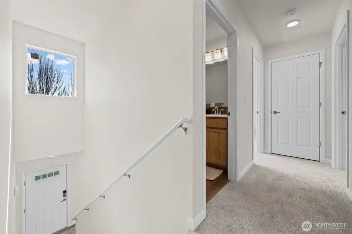 Second level hall with linen closet at the end