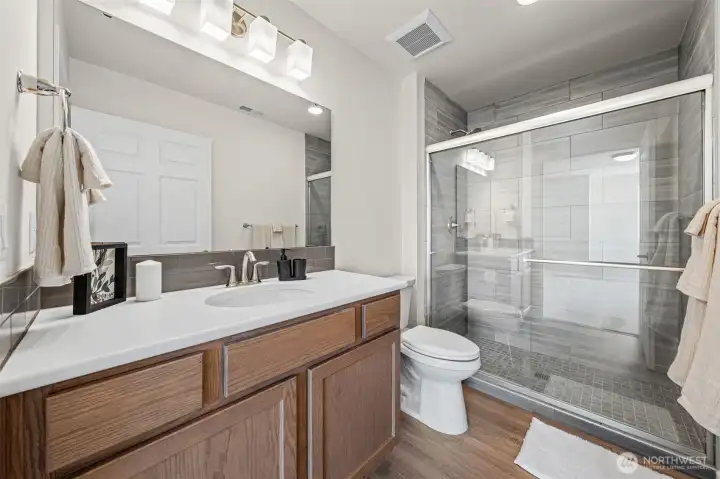 Primary ensuite with walk-in shower.