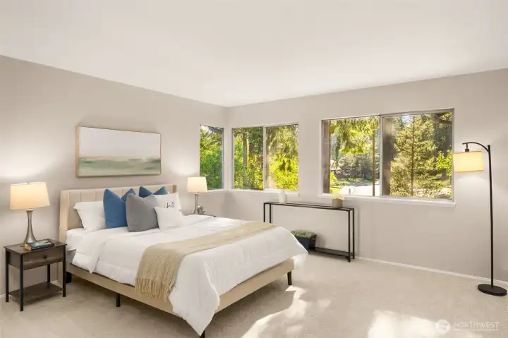 Spacious primary suite is beautifully updated