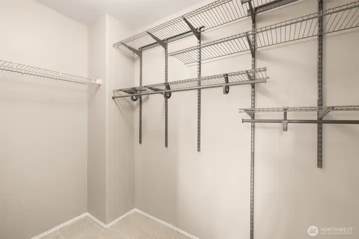 Walk in closet with custom organization system