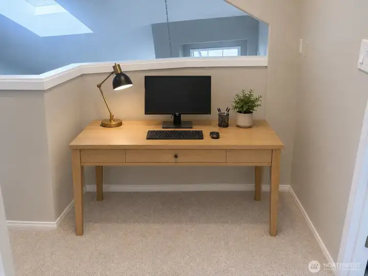 Versatile loft offers the perfect space for a home office or study nook