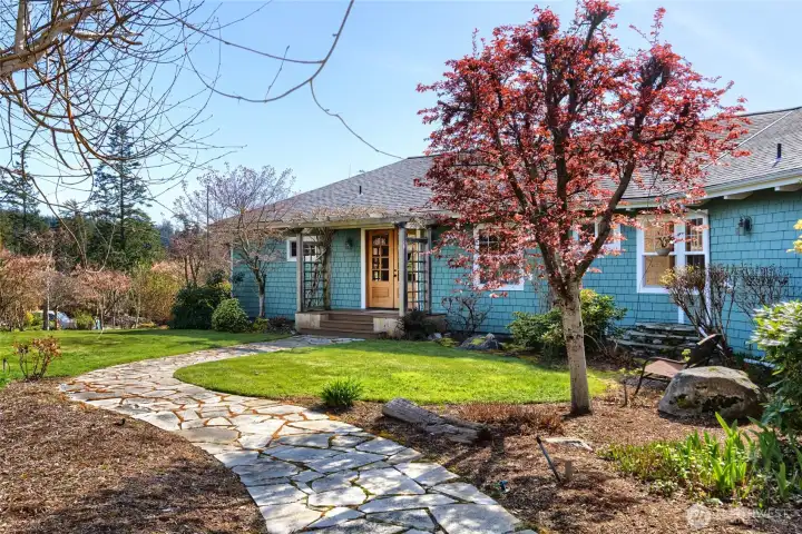 welcoming flagstone path as you enter property