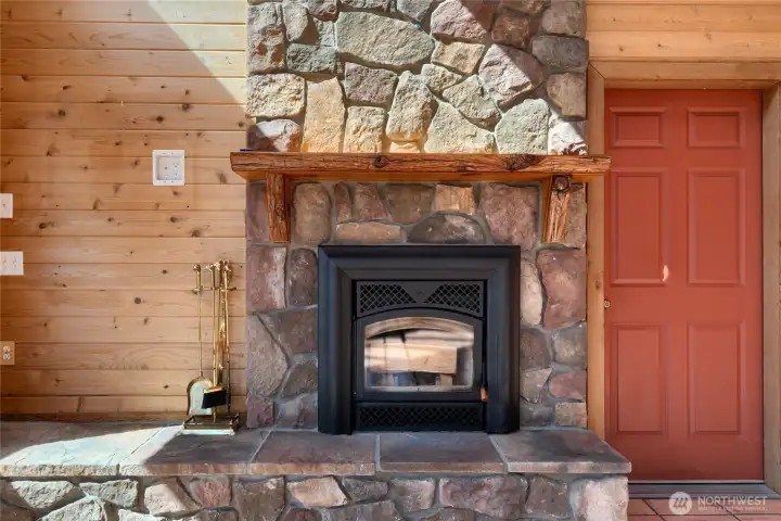 Rock faced wood fireplace, fir mantle slab