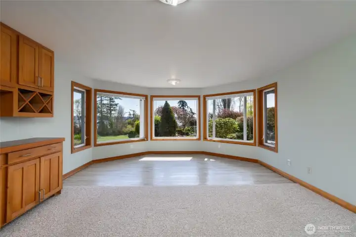 Large craft/flex room with panoramic windows has built-ins