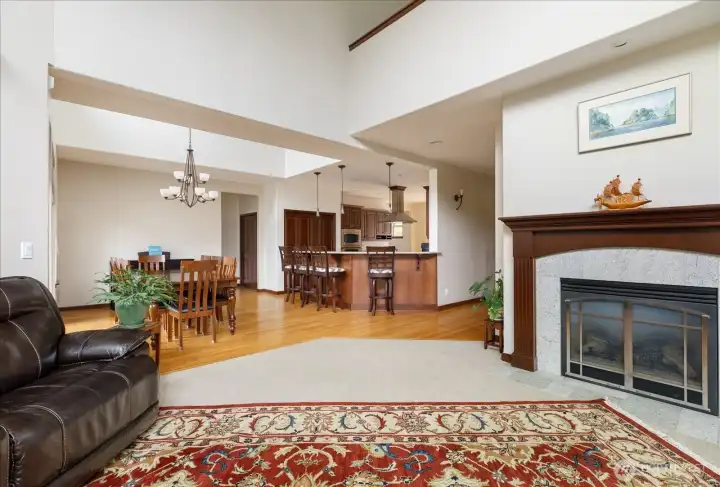 Living Room is adjacent to the open concept dining room & kitchen area.
