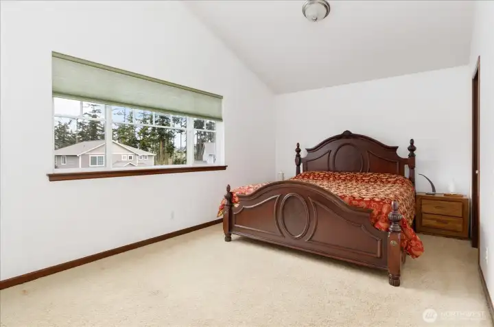 Spacious 3rd Bedroom on the upper level with a walk-in closet.