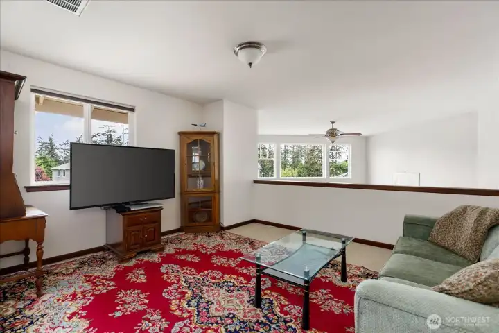 This large Loft on the Upper Level is a perfect place to watch your favorite TV shows & movies, or read a good book as you relax.
